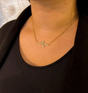 collier plaqué or avec pendentif battement de cœur 