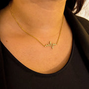 collier plaqué or avec pendentif battement de cœur 